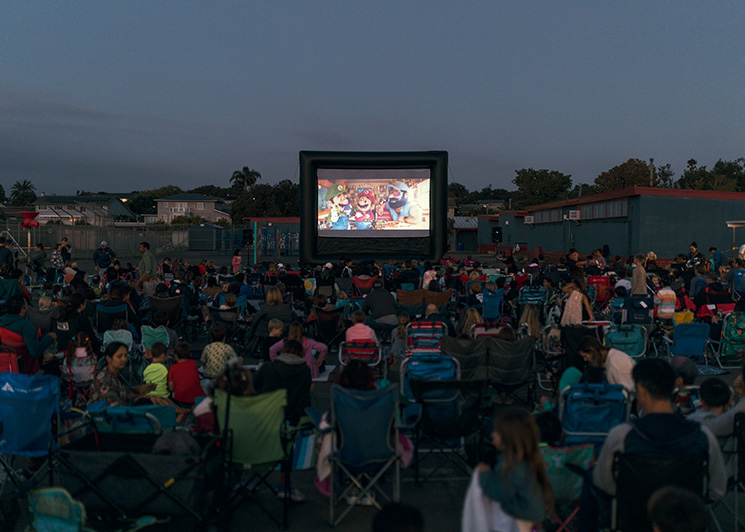 Mario themed movie party on a giant FunFlicks inflatable screen
