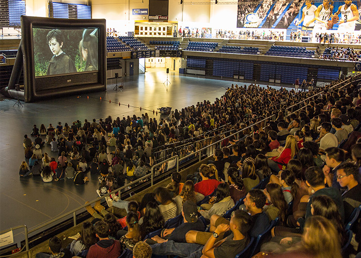 FunFlicks movie party in a university gymnasium